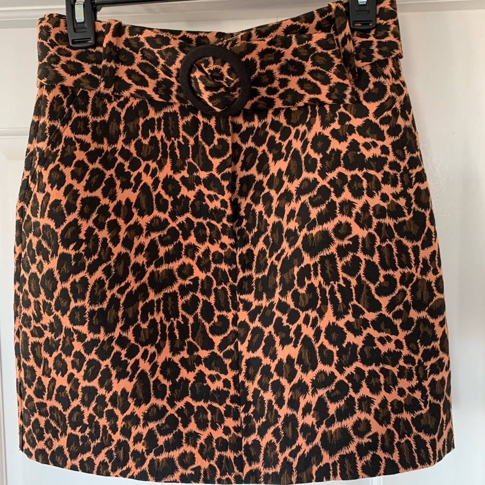 Adorable and sassy belted mini skirt